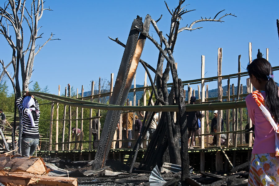  Rebuilding the bamboo houses after a big fire destroyed 15 of them